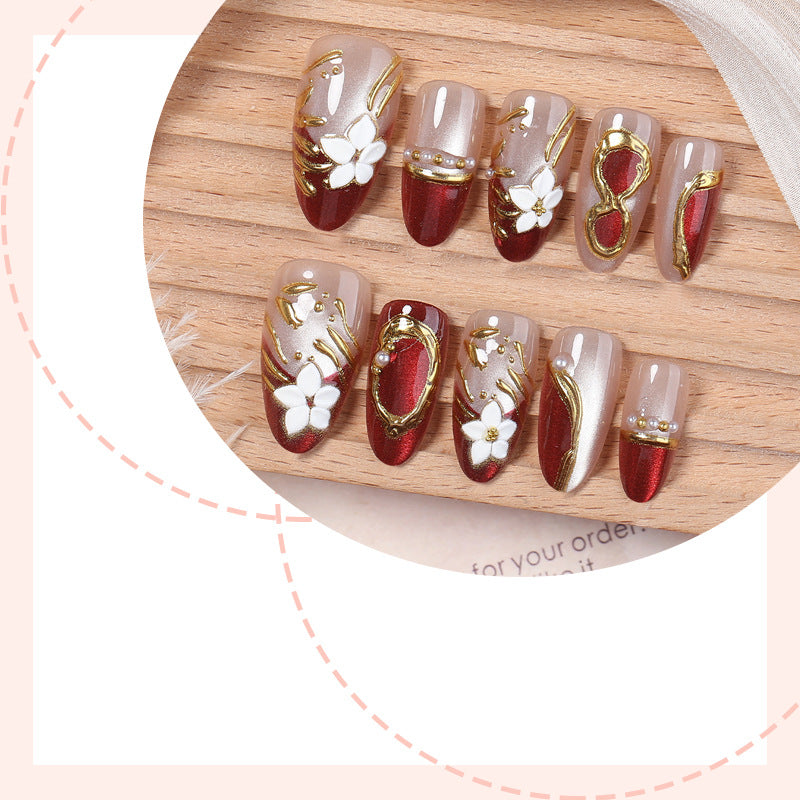 Artistic Press-On Nail Set with Floral and Metallic Accents Stornfield