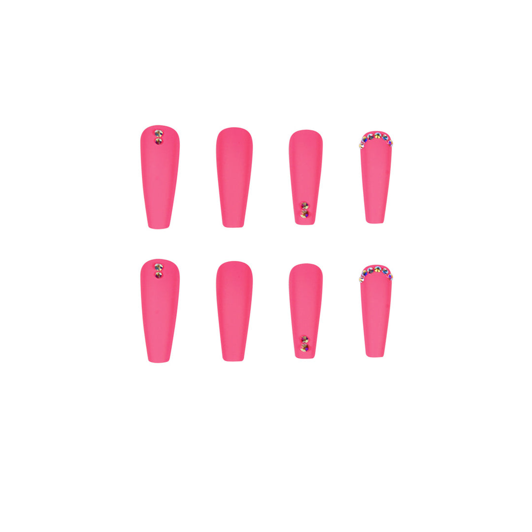 Artificial nail extensions with glitter accents Stornfield
