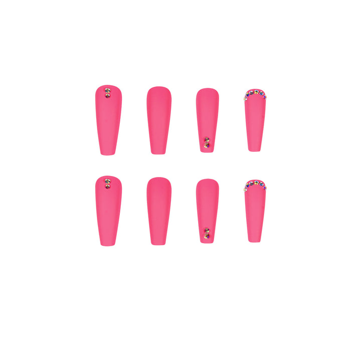Artificial nail extensions with glitter accents Stornfield