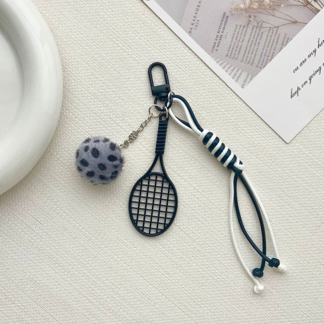 Tennis Racket and Fur Ball Keychain Stornfield