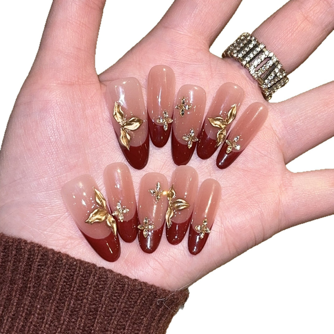 Artificial nails with luxurious flower and glitter elements Stornfield