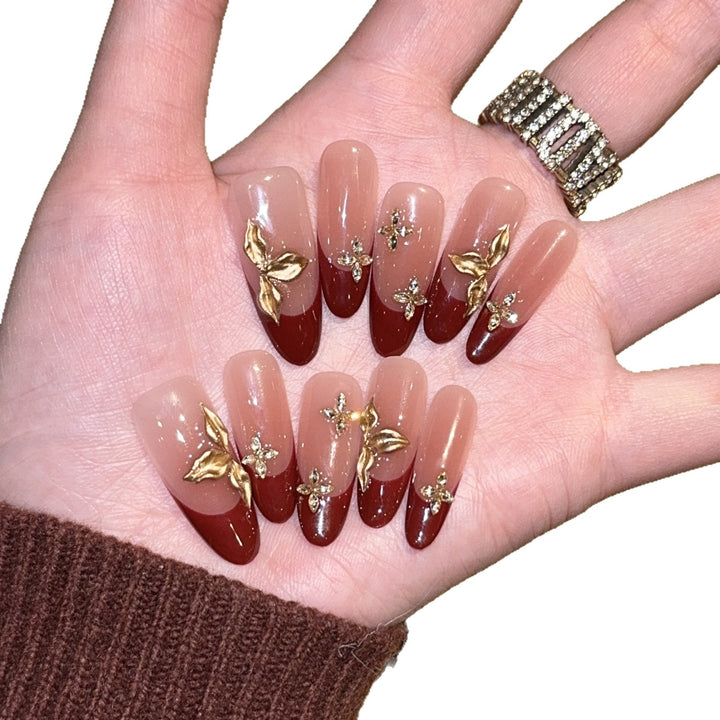 Artificial nails with luxurious flower and glitter elements Stornfield
