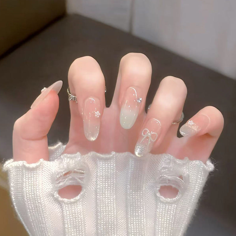 Decorative Press-On Nail Art with Bow and Gem Accents Stornfield