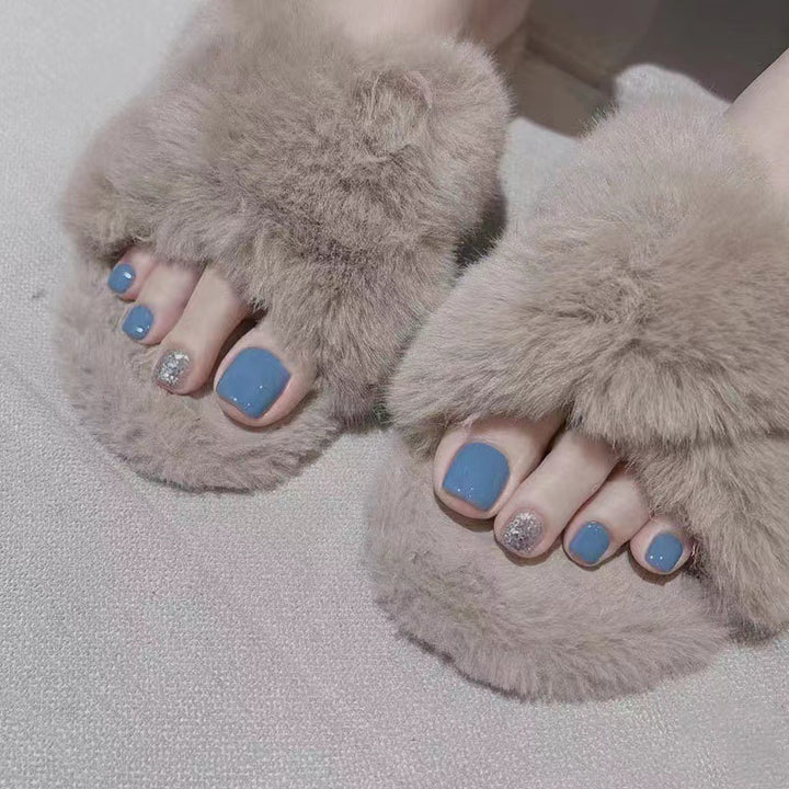 Artful toenails with glitter and metallic accents Stornfield