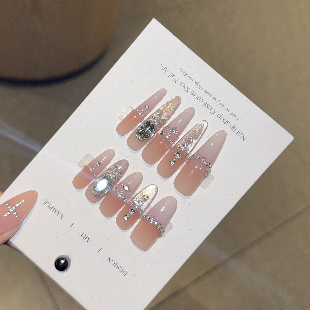 Artificial nails with elegant crystal decorations Stornfield