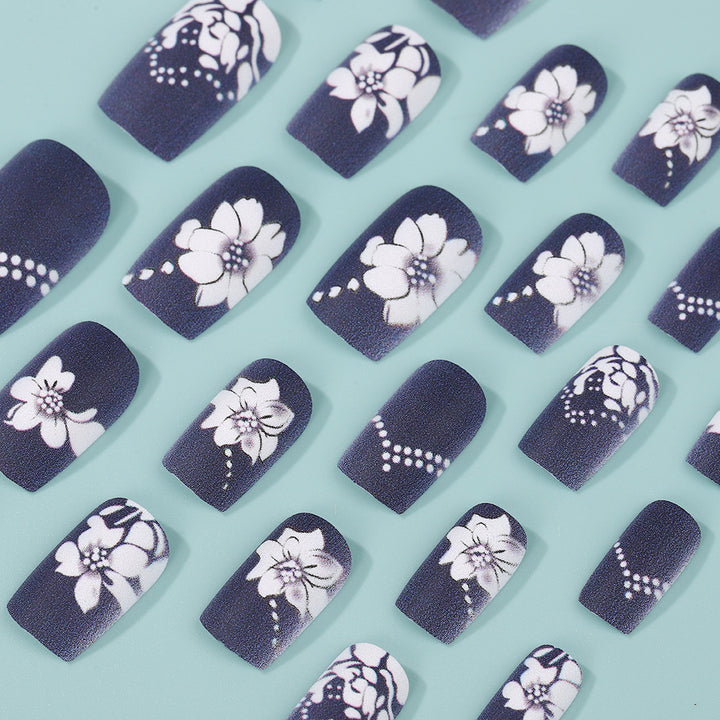 Artificial nails with elegant floral designs Stornfield