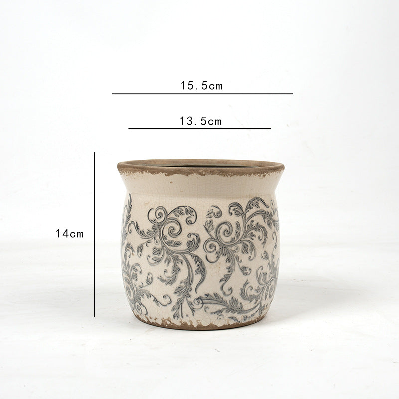 Decorative ceramic plant container with artistic design Stornfield