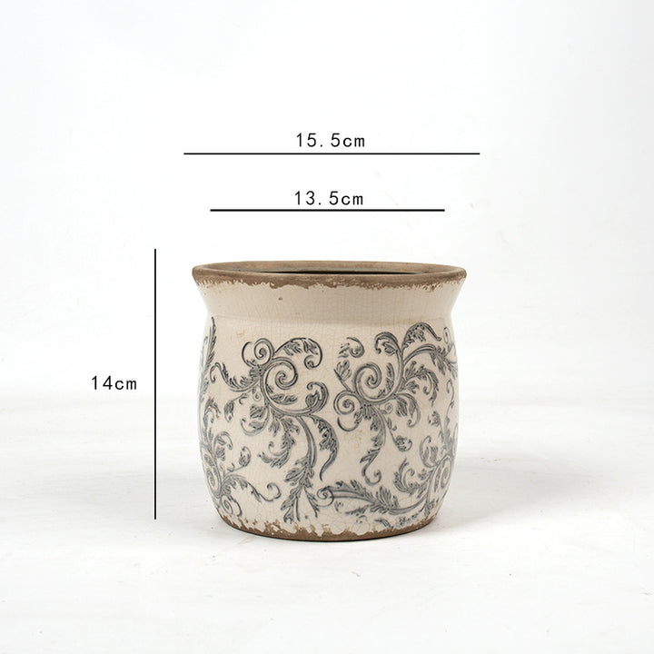 Decorative ceramic plant container with artistic design Stornfield