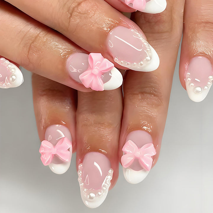 Artificial nail set with elegant bow and pearl decorations Stornfield