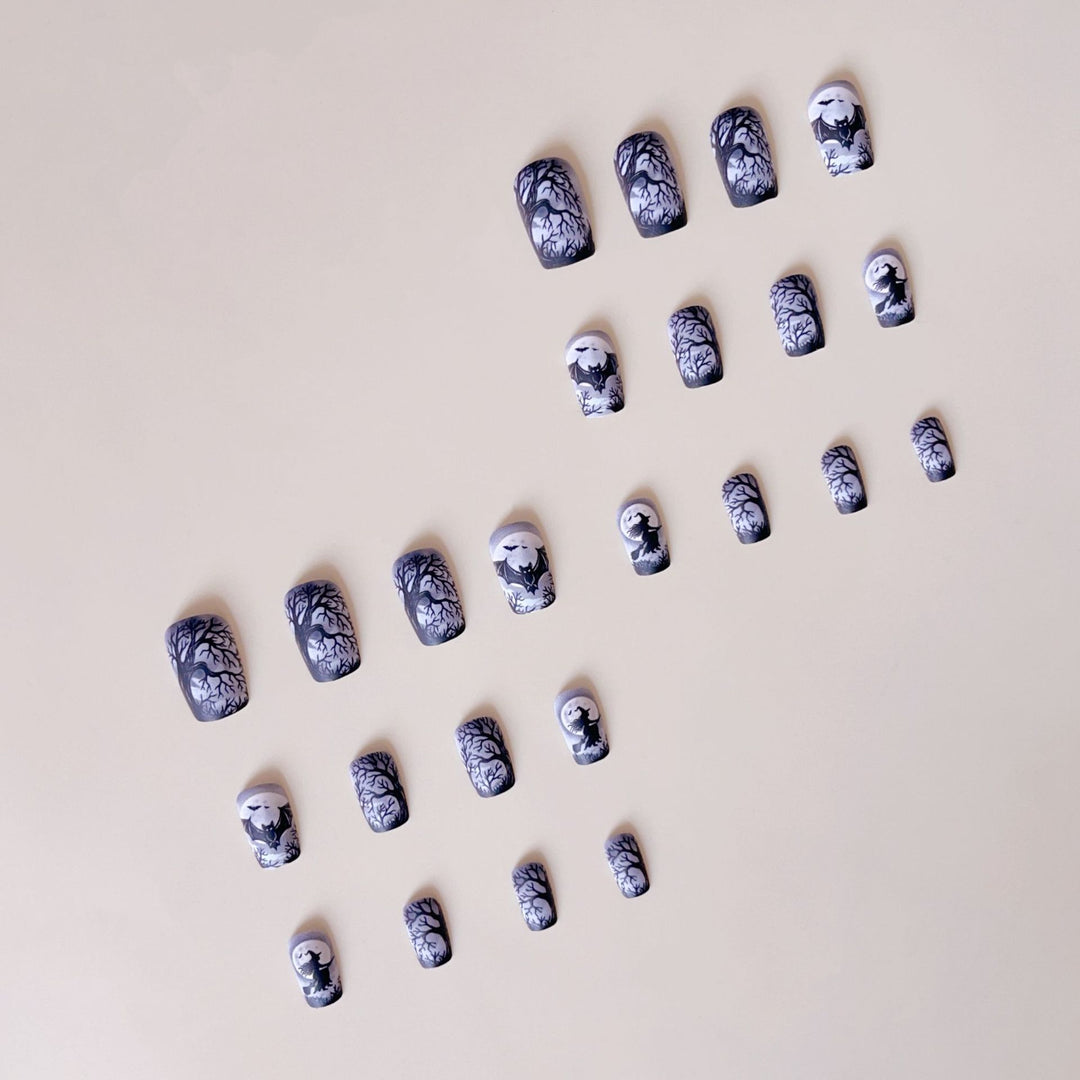 Nail art set with spooky Halloween design and intricate 3D decorations Stornfield