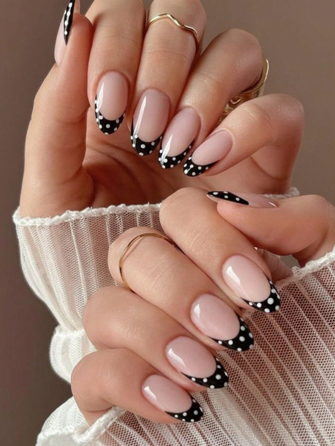 Artificial nail set with circular dots and modern tips Stornfield