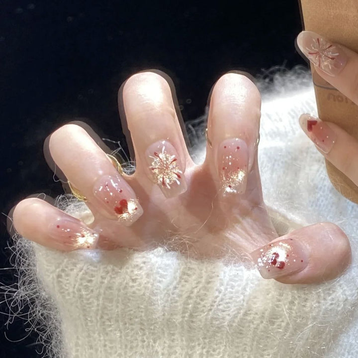 Artificial nails with romantic heart design and glitter coating Stornfield