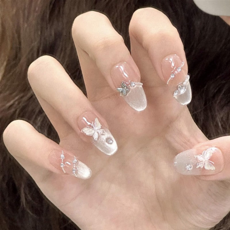 Artificial nail set with elegant tips and crystal accents Stornfield