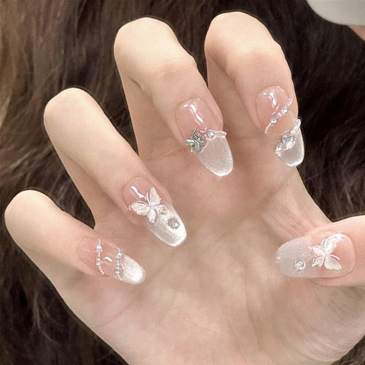 Artificial nail set with elegant tips and crystal accents Stornfield
