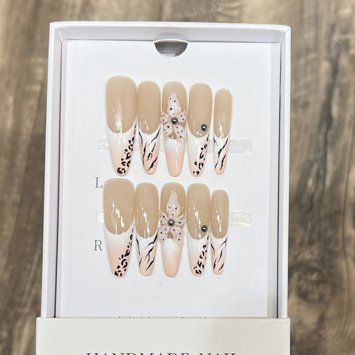 Artistic Stiletto Nail Art Set with Elegant Decorative Elements Stornfield