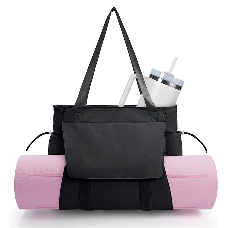 Versatile sports bag with separate yoga mat carrying compartment Stornfield