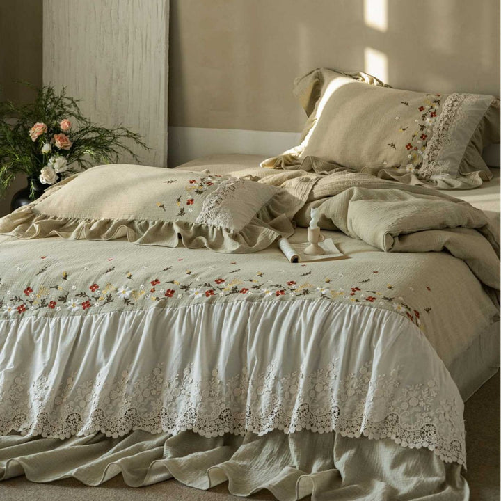 Romantic bedding set with lace bed skirt, embroidered floral decor and ruffle