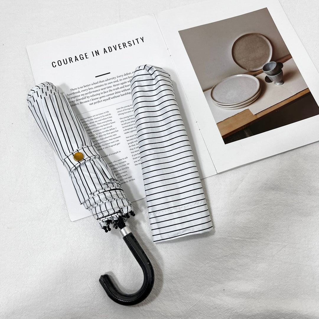 Women Folding Umbrella Stornfield
