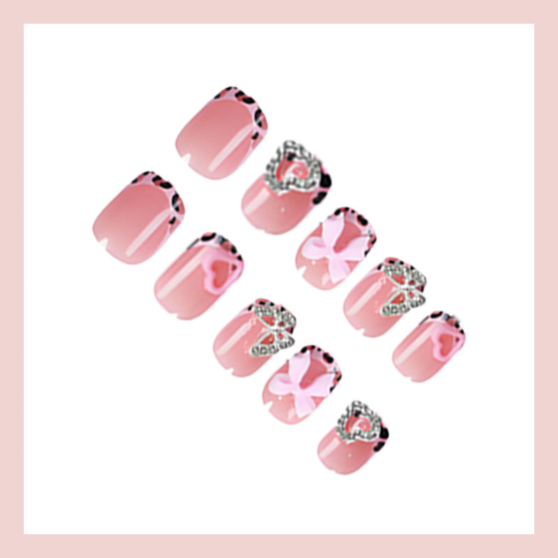 Artificial nail art with embellishments Stornfield