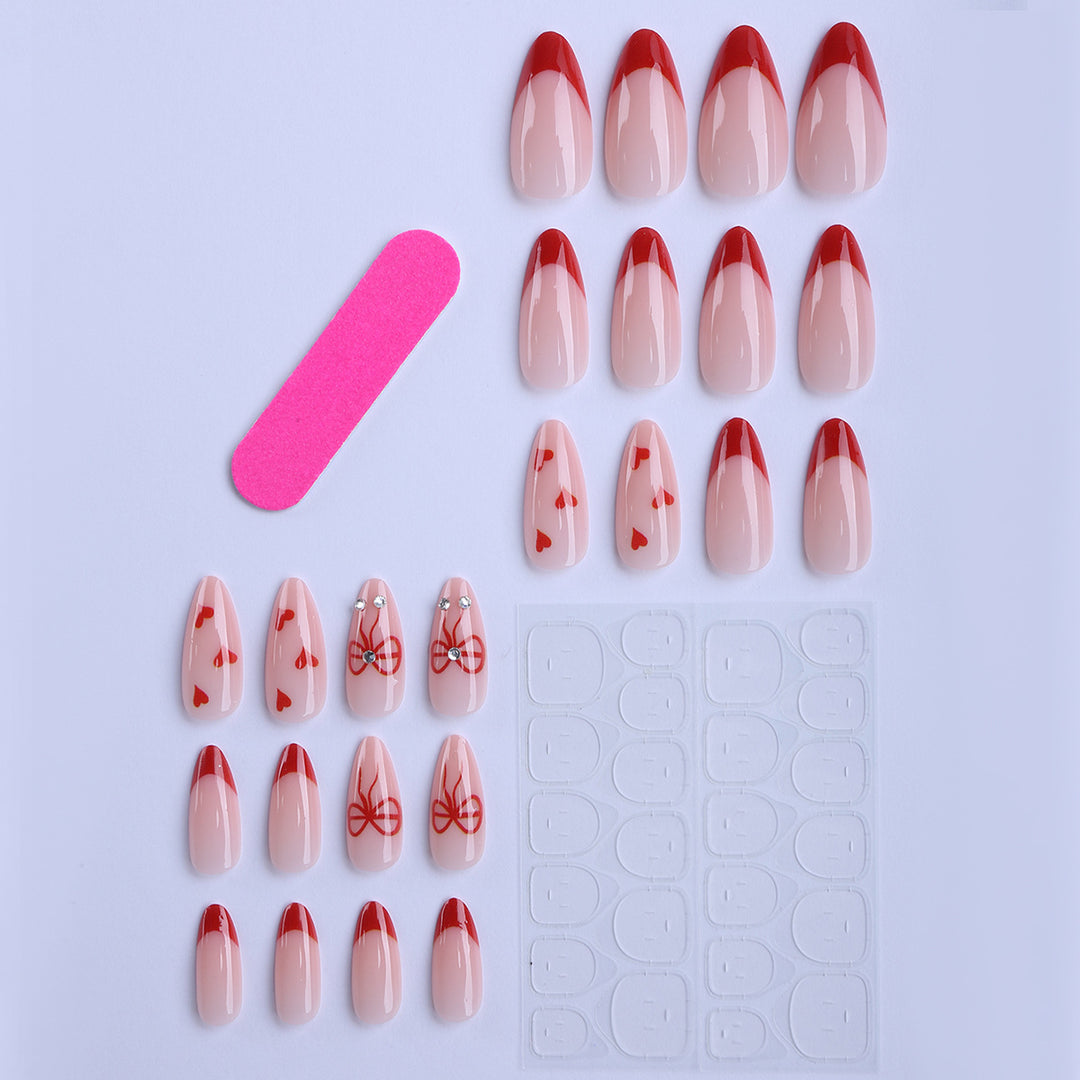 Artificial nails with elegant heart designs and glamorous accents Stornfield