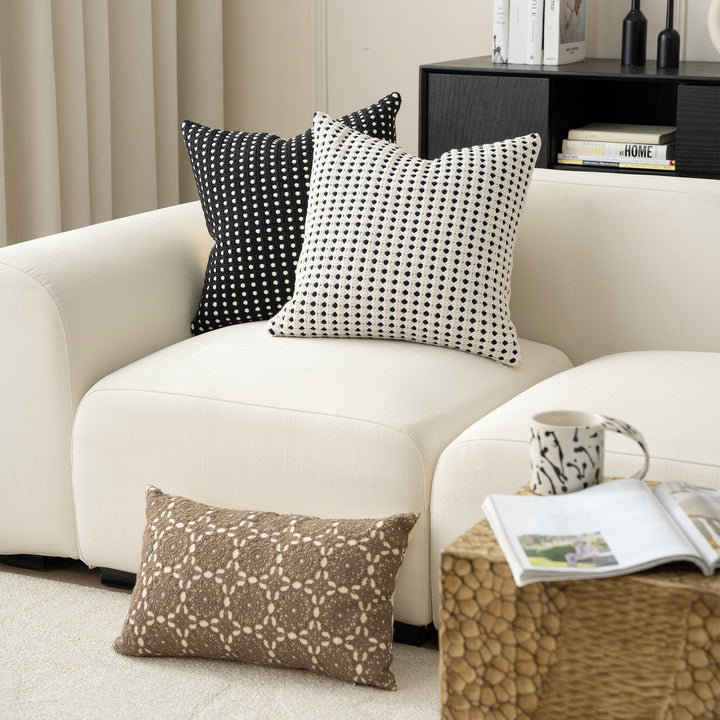 Woven decorative pillow with textured dot tufting