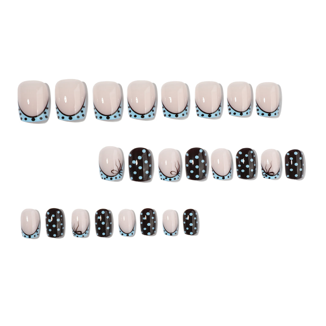 Artful nail extensions with playful dots and elegant design Stornfield