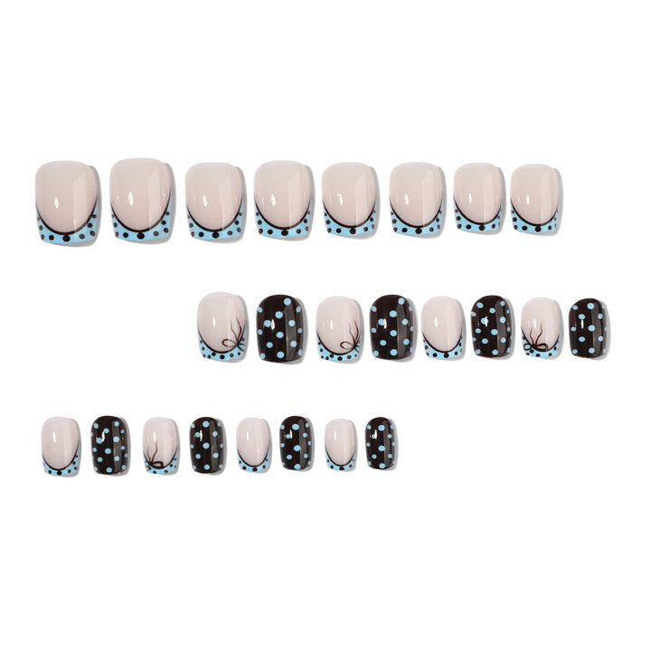 Artful nail extensions with playful dots and elegant design Stornfield
