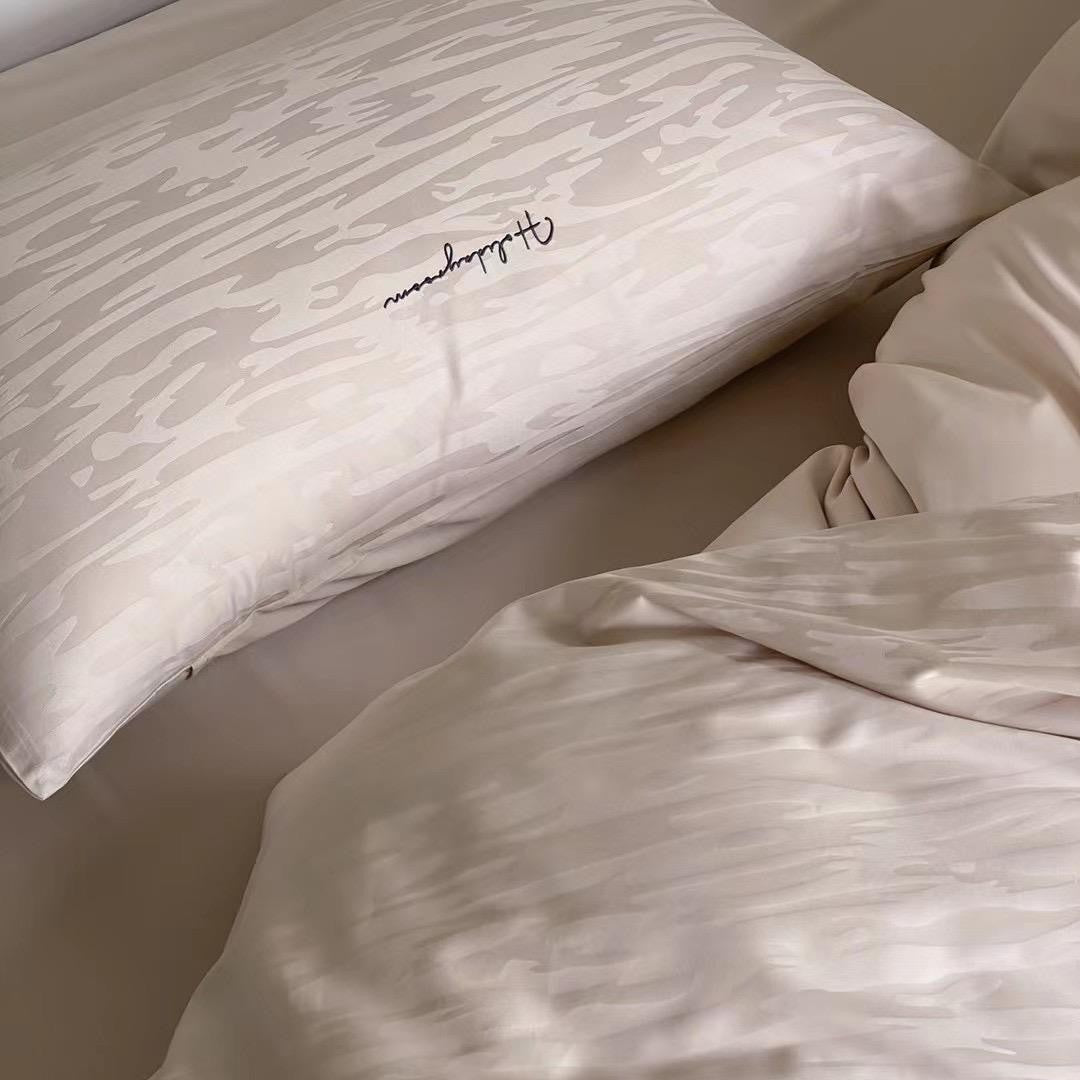 Finest cotton satin bedding set with textured wave pattern and hotel closure