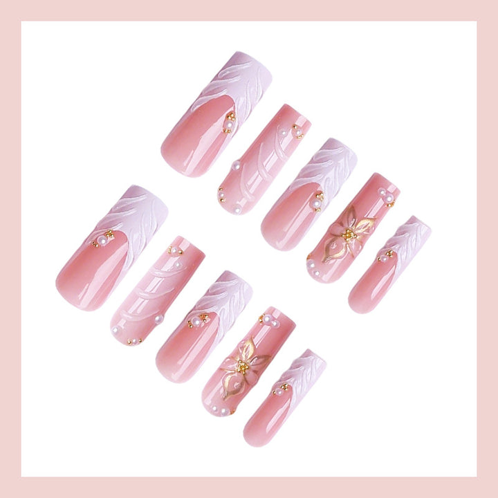 Acrylic nail set with elegant floral designs Stornfield