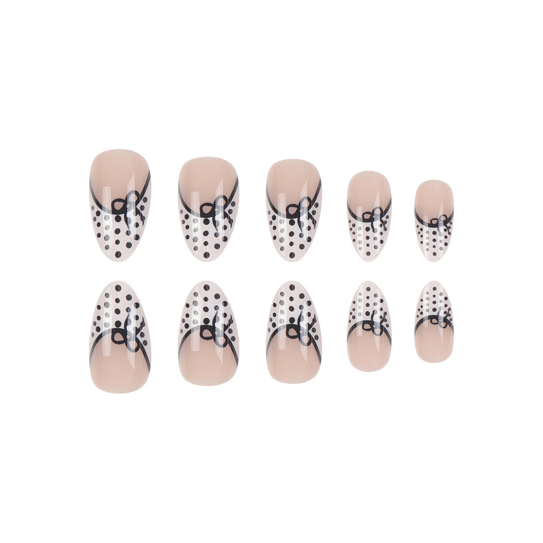 Elegant Stiletto Press-On Nails with Polka Dot Design and Bow Accents Stornfield