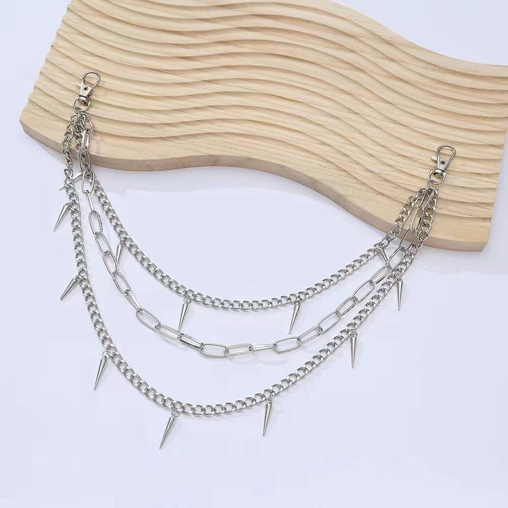 Fashionable chain belt with spiked details Stornfield