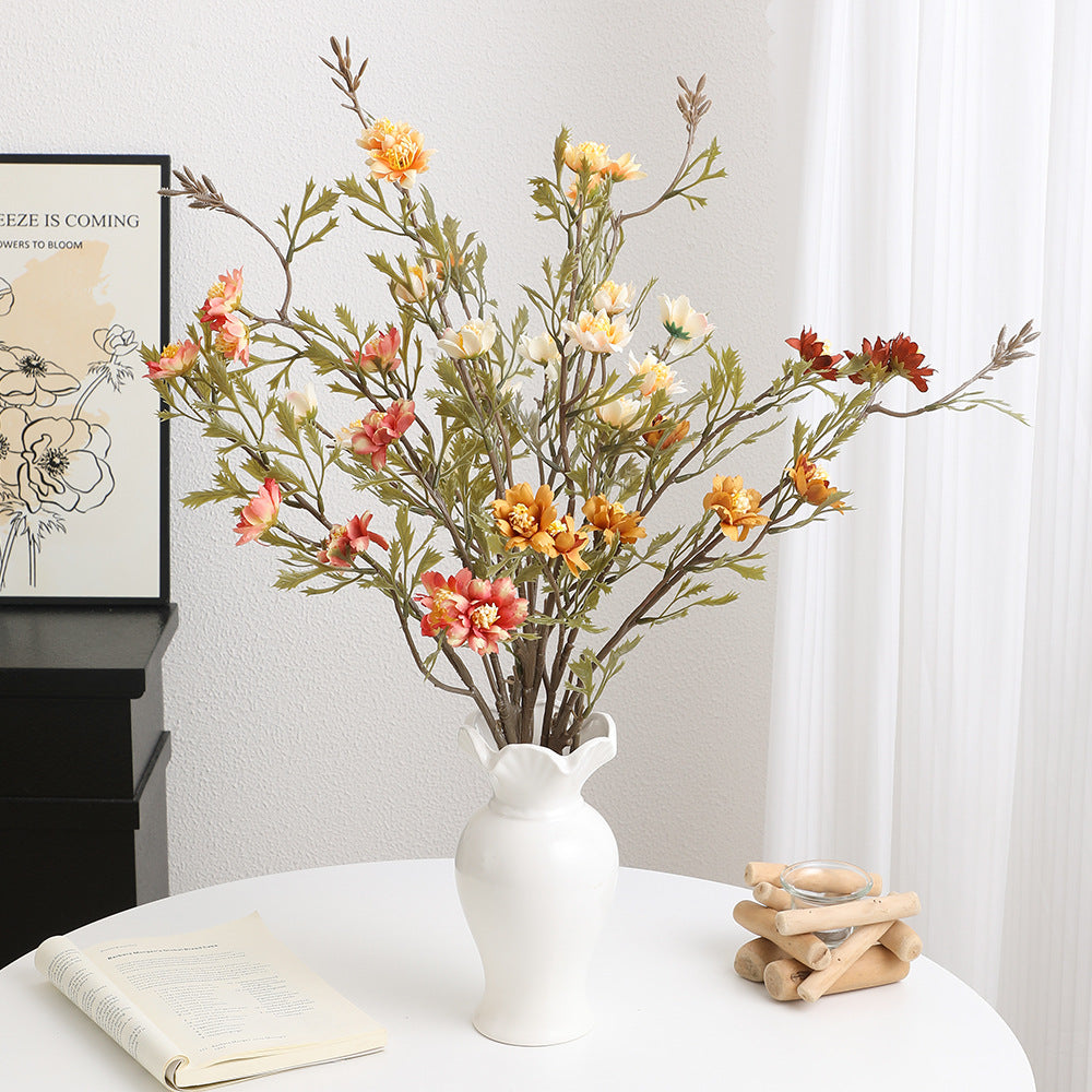 Elegant artificial flower branch with detail-loving blossoms