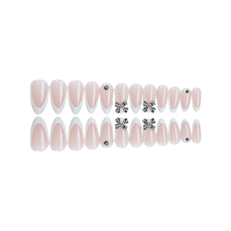 Acrylic nail set with elegant decorative embellishments Stornfield