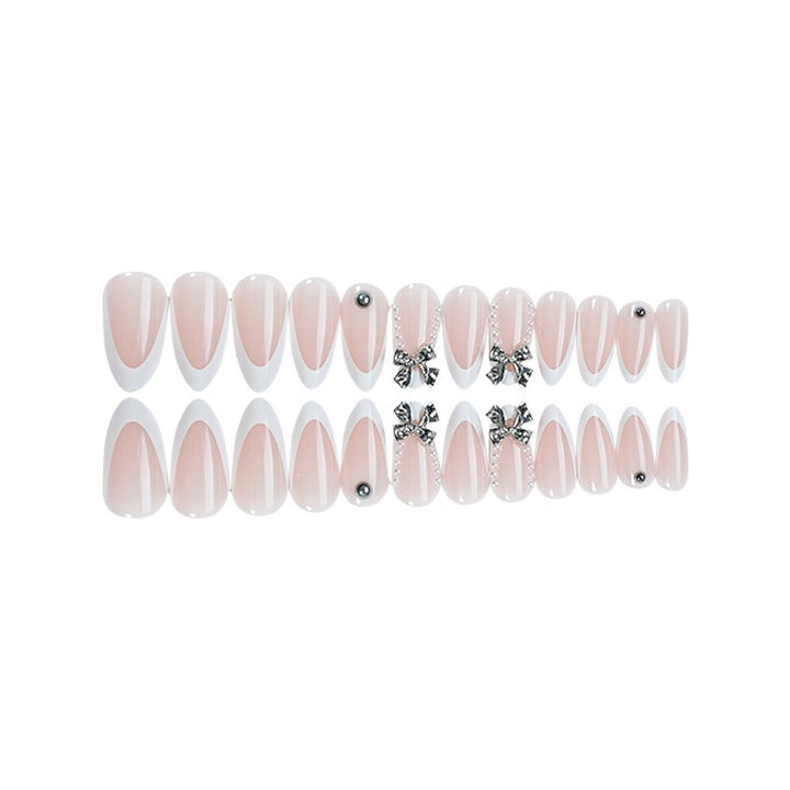 Acrylic nail set with elegant decorative embellishments Stornfield