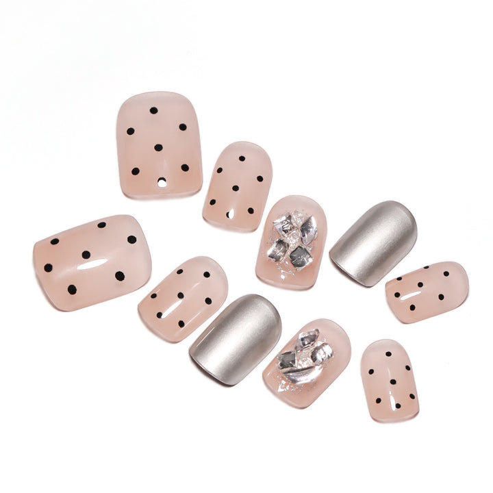Artificial nail extensions with elegant accent decoration Stornfield