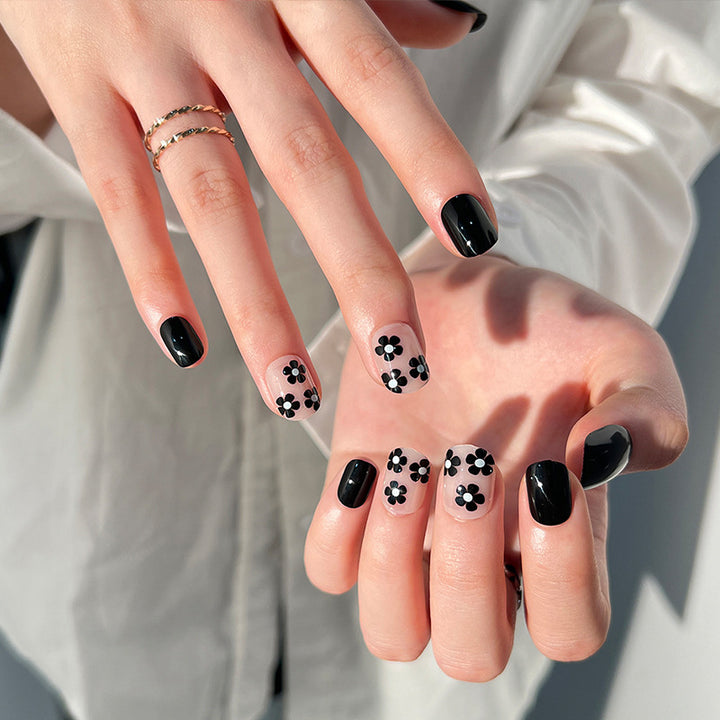 Artful nail extensions with an elegant leaf pattern Stornfield