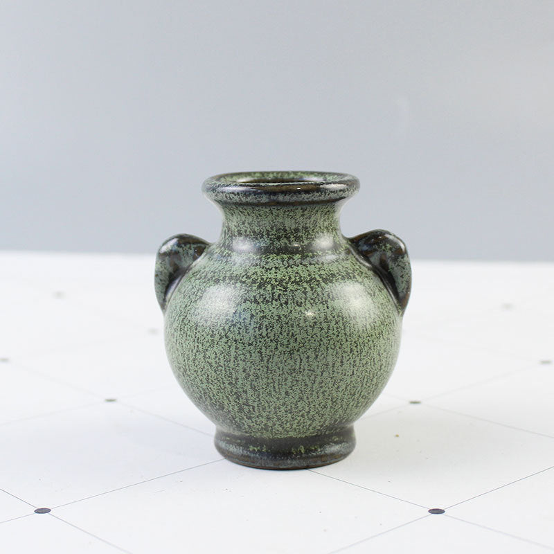 Elegant ceramic vase with artistic design Stornfield