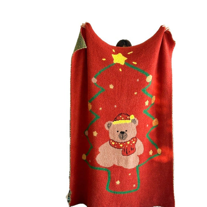 Cozy blanket in knit look with large animal face and soft terry surface