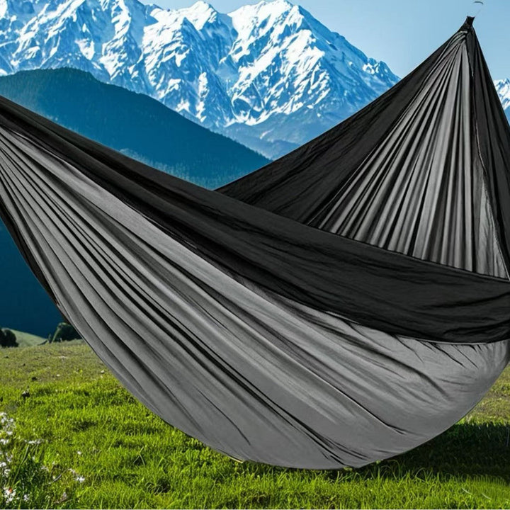 Ultralight portable parachute camping hammock with reinforced tree straps and ripstop nylon Stornfield
