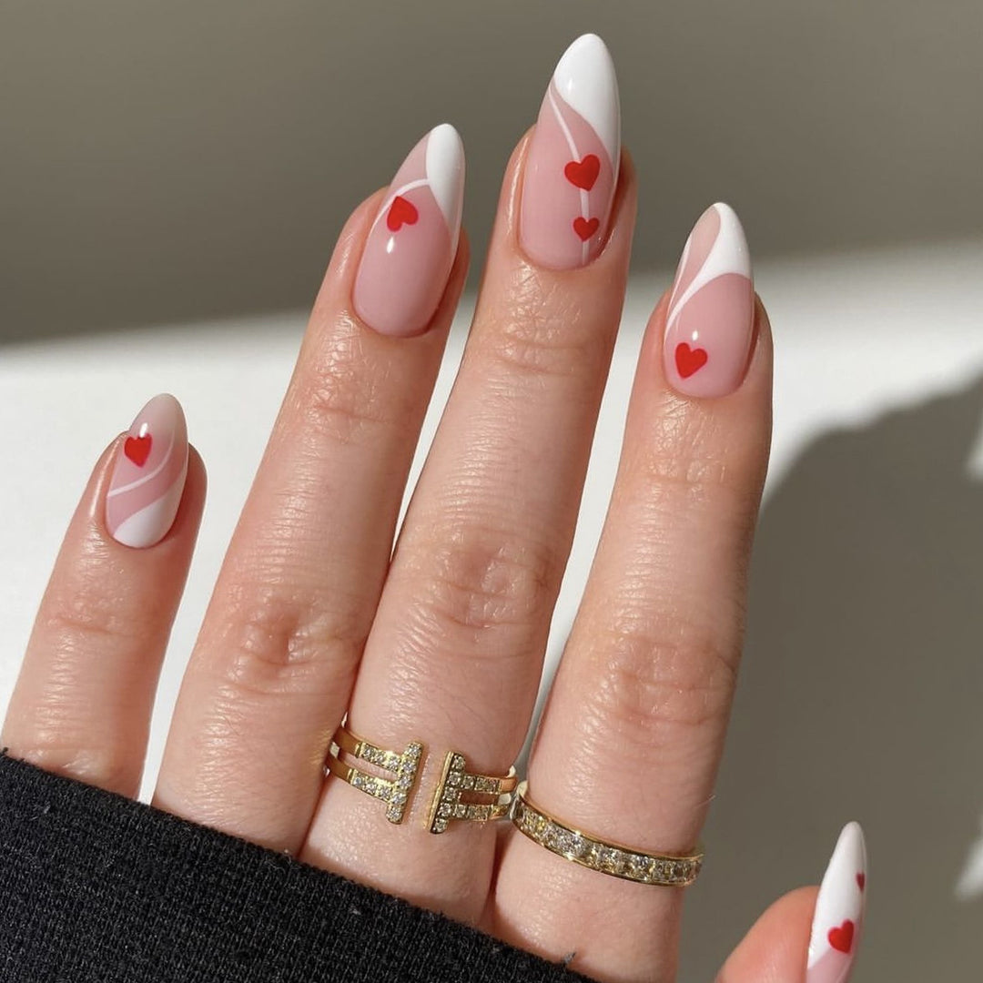 Heart-Embellished Stiletto Nail Art Stornfield
