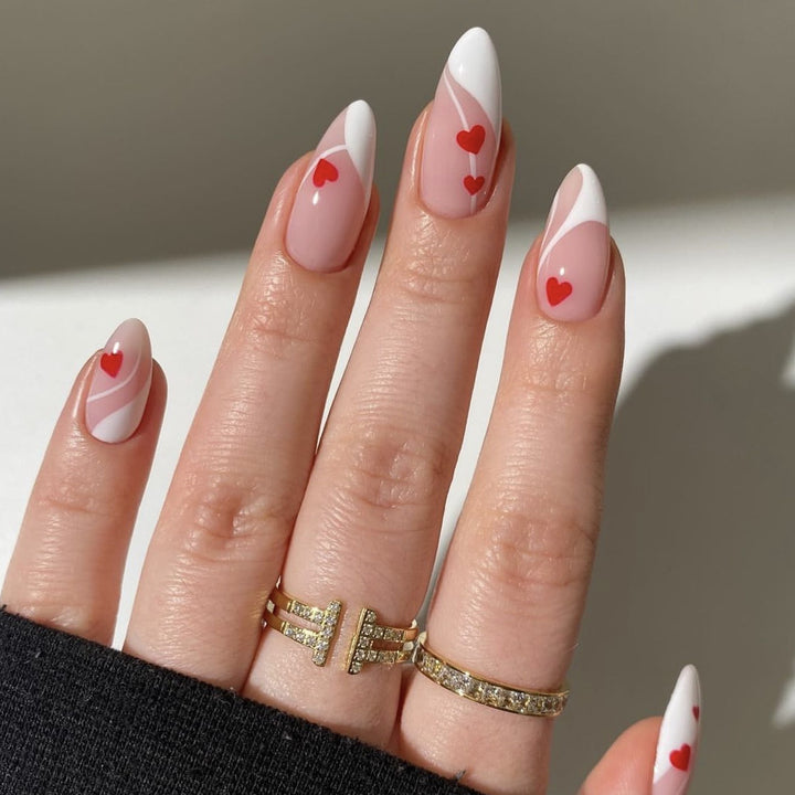 Heart-Embellished Stiletto Nail Art Stornfield