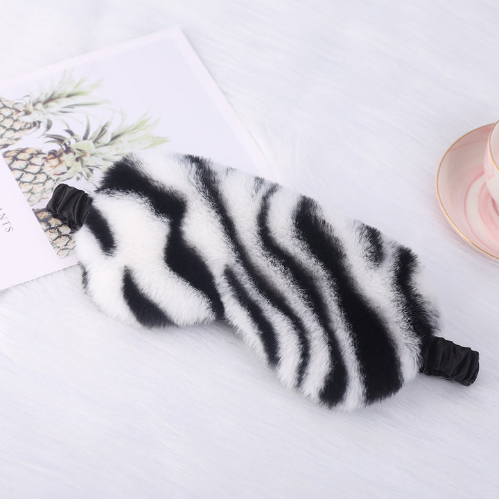 Women's luxury faux fur sleep mask with leopard print, extra soft padding and elastic comfort band Stornfield