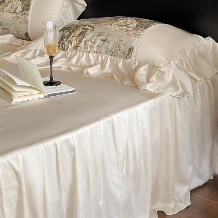 Luxurious satin bedding set with toile motif, ruffle and lace trim