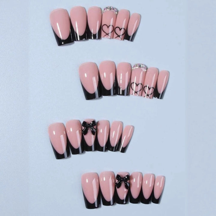 Acrylic nail set with elegant heart and bow design Stornfield