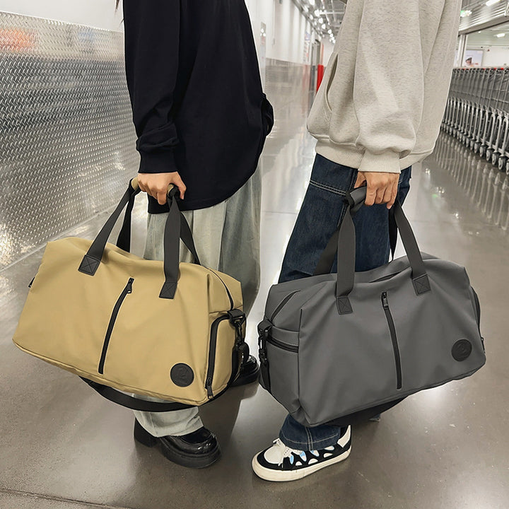 Sporty travel bag with water-repellent material and practical organizer compartments Stornfield