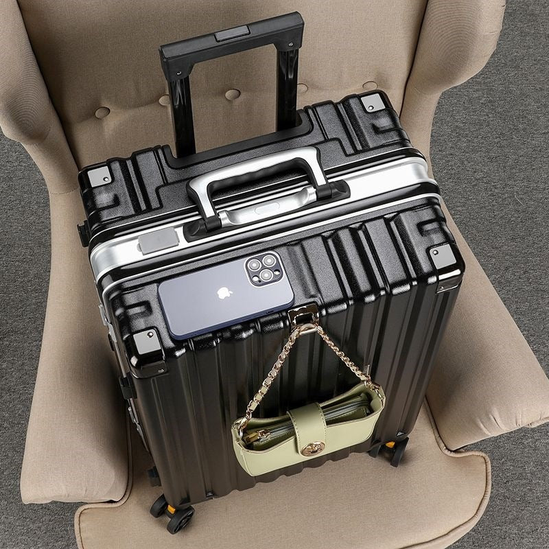 Hard-shell suitcase with double safety lock and sturdy rolling system Stornfield