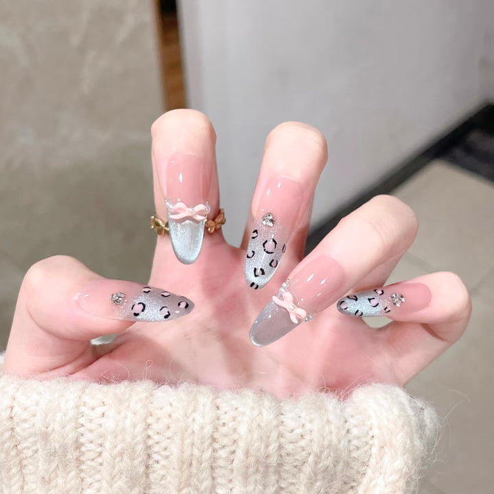 Artistic Stiletto Press-On Nail Set with Leopard Print and Bow Accents Stornfield
