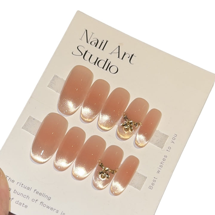 Artificial nails with elegant tip design and gold accents Stornfield