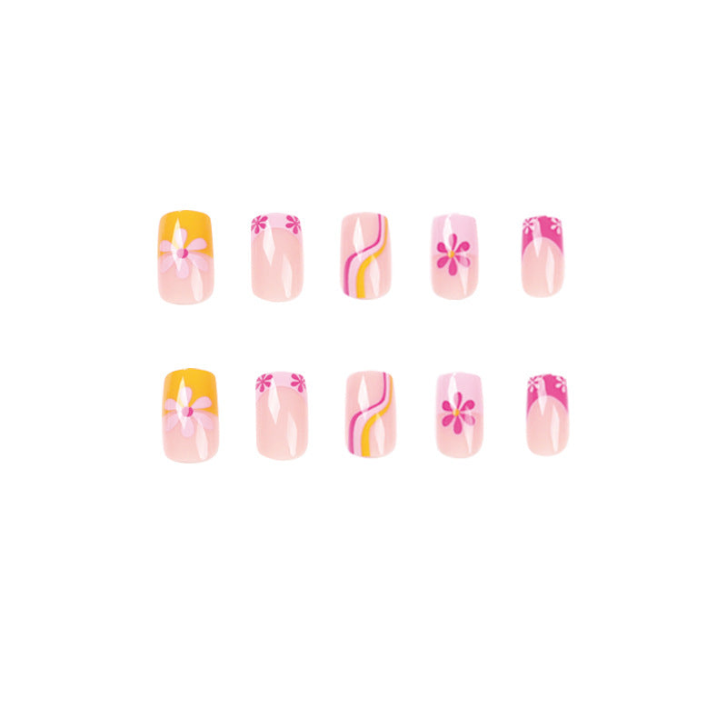 Creative Nail Art with Floral Design and Colorful Accents Stornfield