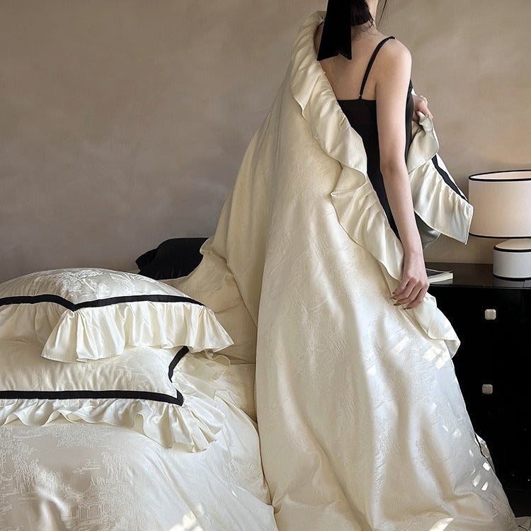 Luxurious cotton satin bedding set with jacquard texture, ruffles, and contrasting piping